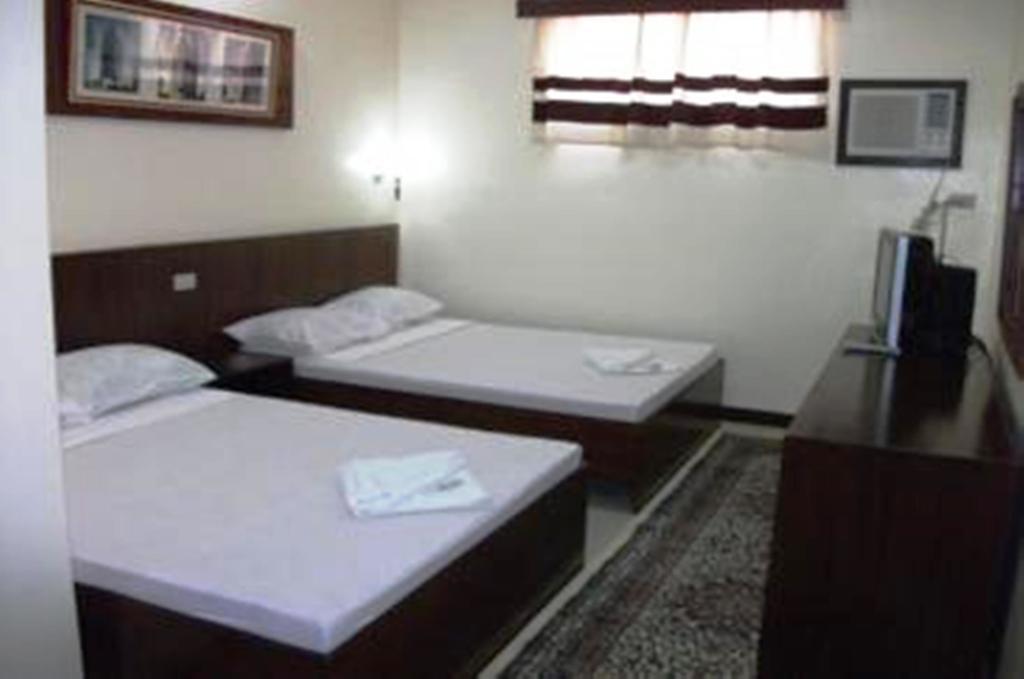 Bed and Breakfast Ysabelle Mansion Puerto Princesa Zimmer foto