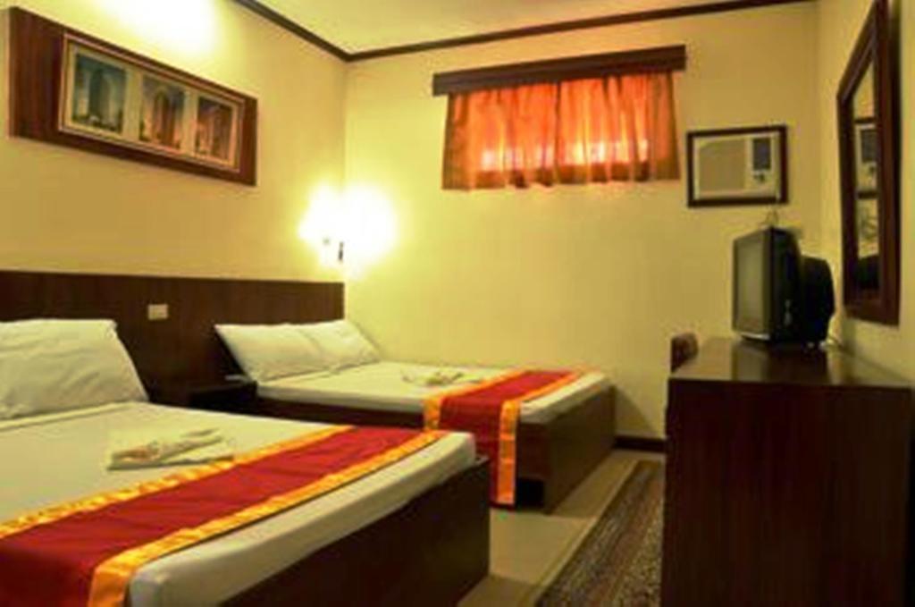 Bed and Breakfast Ysabelle Mansion Puerto Princesa Zimmer foto