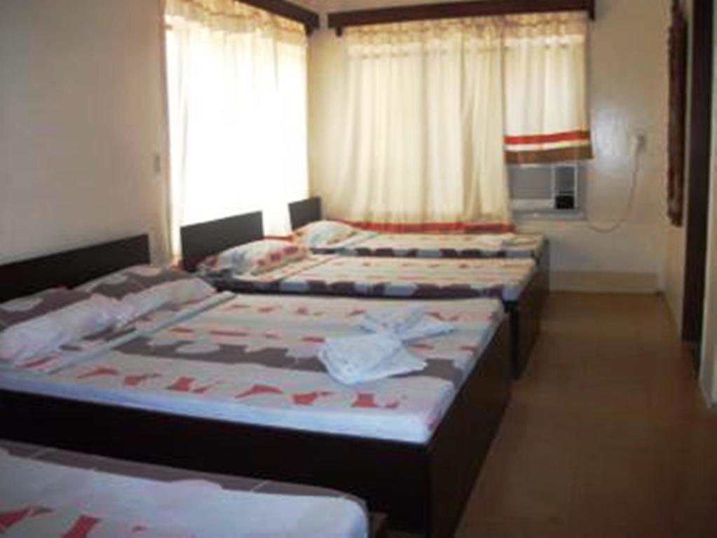 Bed and Breakfast Ysabelle Mansion Puerto Princesa Zimmer foto